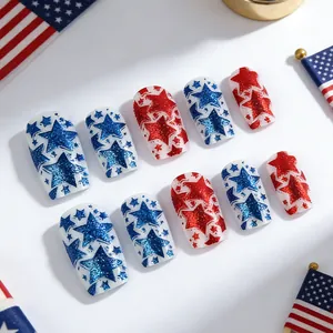 Short square press-on nails with red and blue glitter stars and American flag design