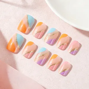 Short square press-on nails with colorful pastel waves and gold glitter stripe accents