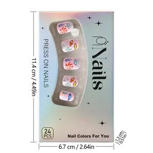 Detail of pink underwater world press-on nails with fish and coral patterns in packaging