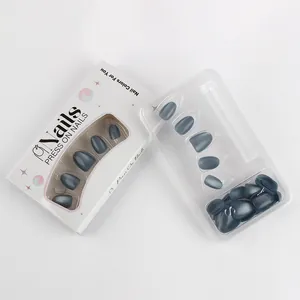 Faux ongles œil-de-chat bleu brumeux ovale court en boîte de vente blanche avec plateau clair