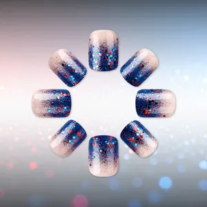 Close-up of short square-oval faux nails with red and blue glitter gradient tips