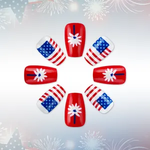 Close-up of Independence Day square press-on nails with red white blue stars and fireworks