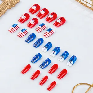 Detail of red white and blue Independence Day press-on nails with stars and flower patterns