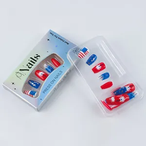 Close-up of red white and blue press-on nails with stars and floral patterns in packaging