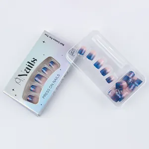 Detail of red white and blue gradient press-on nails with glitter finish and packaging