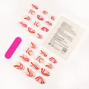 Faux ongles ovales nude brillants avec motifs à vagues rouges et kit d'application