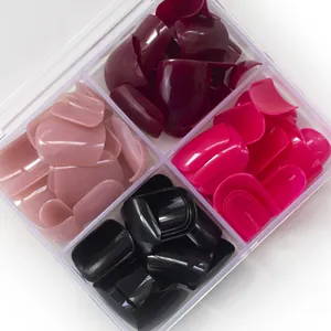 Short square press-on nail set in nude pink, burgundy, rose, and black in a 4-compartment box