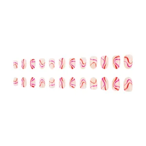Faux ongles ovales avec motifs de vagues abstraites colorées sur base nude 24pcs