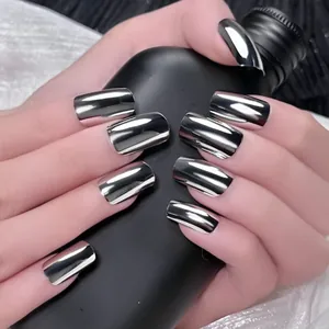 Short square chrome silver press-on nails with metallic mirror finish on model hands