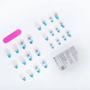 Detail of almond-shaped starfish press-on nails set with beach gradient blue patterns