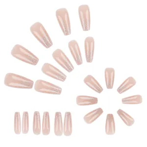Pink nude glitter gradient press-on nails in long coffin shape with silver sparkle
