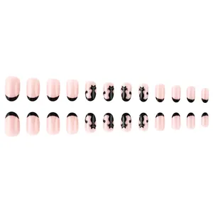 Glossy almond press-on nails set with black cat patterns and pink French tips