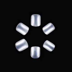 Glossy square short fake nails in pearlescent white for a minimalist professional manicure