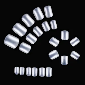 Short square pearlescent white press-on nails with shiny finish for a classic look
