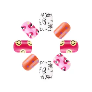 Glossy short press-on nails set featuring smiley faces, heart patterns and colorful polka dots