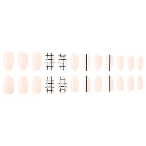 Detail of short almond press-on nails with nude base, black grid patterns, and stripes