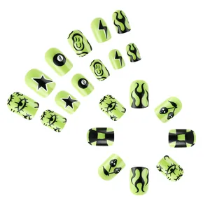 Short neon green Halloween press-on nails with black flame, 8-ball and star patterns