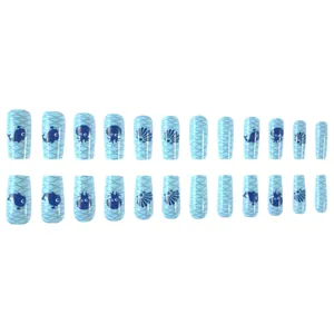 Detailed set of 24 blue press-on nails featuring cute cartoon whale and octopus ocean patterns