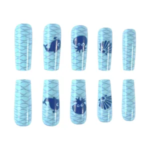 Detail of square blue ocean press-on nails featuring whale, octopus, and shell patterns