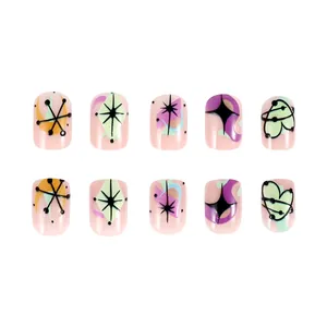 Detail of short square-oval press-on nails with mid-century modern abstract patterns