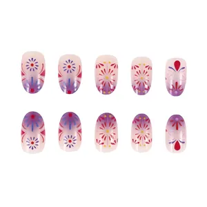 Detail of oval press-on nails featuring purple gradient and colorful floral patterns