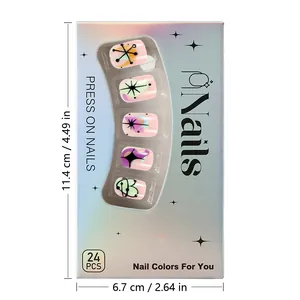 Detailed view of pink press-on nail kit box with size dimensions and star patterns