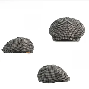 Three-sided view of houndstooth flat cap featuring 3D tailoring and metal shield emblem