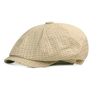 Classic light brown checkered newsboy hat with stylish side leather trim and vintage pattern