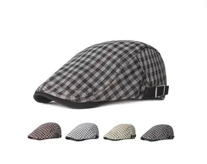 Detail view of vintage plaid ivy cap showing side adjustable metal buckles and color options