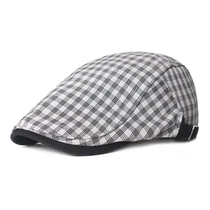 Detailed view of the classic black and white plaid pattern on the vintage cotton beret hat