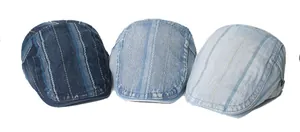 Detailed comparison of three washed denim flat caps in dark blue, medium, and light blue