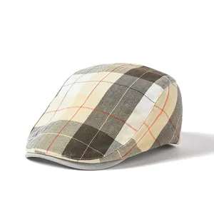 Detailed view of the plaid fabric texture on this classic newsboy flat cap