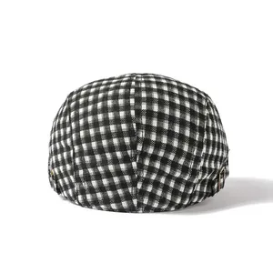Classic black and white checkered ivy cap with adjustable metal buckle on back