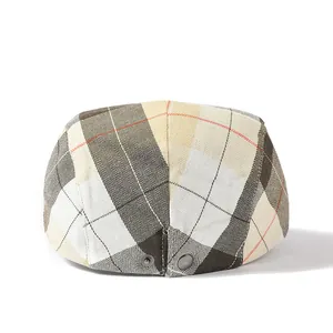 British style plaid beret hat in beige and brown check with metal buckle detail
