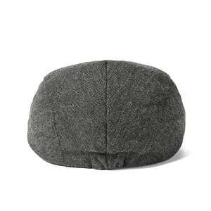 Classic dark grey herringbone flat cap for men with high quality tweed fabric texture