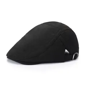 Classic black wool flat cap with adjustable metal side buckle and textured finish
