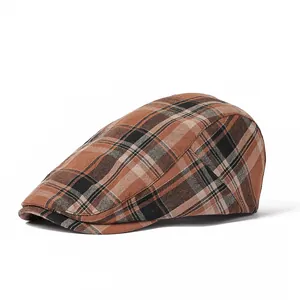 Classic plaid beret in brown and beige colors, stylish flat cap for men and women
