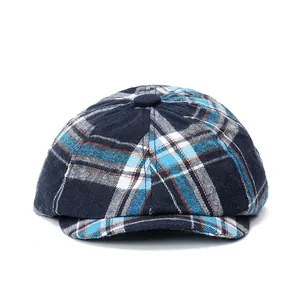 Classic plaid newsboy cap with vintage blue checkered pattern and top button detail
