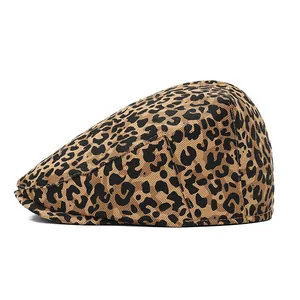 Close-up of leopard print flat cap showing high-quality twill cotton texture and stitching