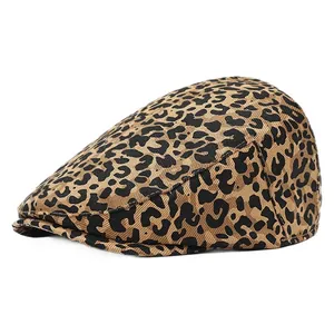 Detailed side view of cotton flat cap with classic leopard print and structured brim