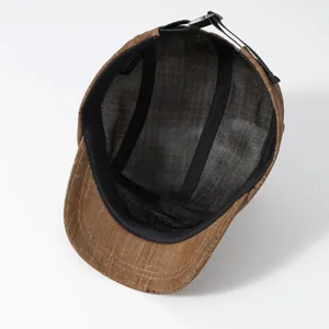 Detail view of washed vintage cap showing inner lining seams and cotton blend wash label