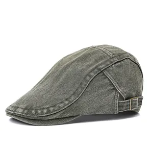 Vintage washed denim beret cap in dark grey-green with adjustable metal side buckle