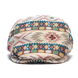 Ethnic bohemian style beret with colorful geometric jacquard pattern on white background