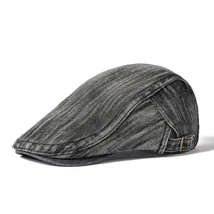 Retro washed denim flat cap in dark grey with adjustable metal buckle and twill texture