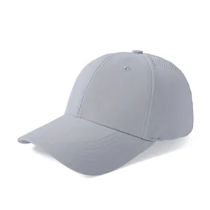Detail of light gray quick-dry baseball cap showing breathable mesh and tear-resistant fabric
