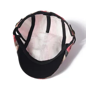 Detail of vintage striped beret interior featuring adjustable metal buckle and inner lining