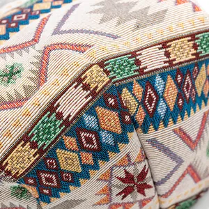 Close-up of ethnic jacquard weaving pattern on a vintage bohemian style beret hat