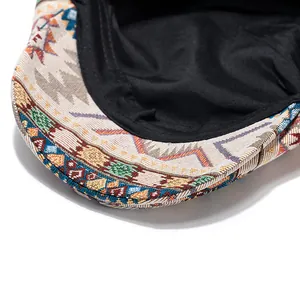 Detail shot of the geometric jacquard pattern and black inner lining of this vintage beret