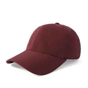 Side view of burgundy quick-dry mesh baseball cap with laser-cut breathability holes