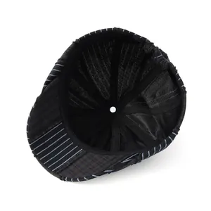 Detail van de vintage baret binnenzijde met zweetband en elastische verstelbare band